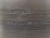 OS Walker AXM-13973-1 side wall — stamped markings reading AXM_13973_1 and 20 DIA VACUUM CHUCK
