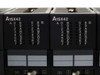 Two Mitsubishi A1SX42 digital input modules side by side – front panel with DIS, F, L indicators and I/O address display