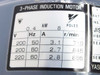 Yaskawa FELQ-5 rating plate showing 3-Phase Induction Motor, 0.4kW, 8 poles, voltage/Hz/amps/RPM table: 200V/50Hz/3.1A/710rpm, 200V/60Hz/2.7A/845rpm, 220V/60Hz/2.8A/855rpm
