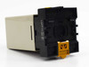 Omron 61F-IPD Floatless Level Switch – rear view of DIN rail socket base with yellow retainer clip and 250V 7.5A rating markings