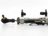 SMC CDM2B20-50+30-H pneumatic cylinder close-up of left rod end and push-in fittings showing wear and corrosion