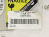 Close-up of Compaq spare label reading 'Replace with Compaq Spare 3.2GB HD [166873-001]' and barcode 166893-001