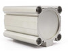 SMC CDQ2B63-75DMZ-A93 compact pneumatic cylinder – rear angled view showing aluminum body and through-hole mounting corners