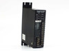Vexta FBLD40A Brushless DC Motor Driver – angled front-left view showing Speed, S.S., S.D. trimpots, Power and Alarm LEDs, EXT-INT switch, motor connector, and I/O terminal block with AC100-115V marking