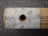 Metal end cap with center hole on US Tucker Ridge military tent pole — cap detail close-up