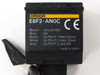 Omron E8F2-AN0C label showing model number, wire color assignments, and CE mark — Made in Japan
