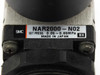 SMC NAR2000-N02 regulator label closeup showing model number, set pressure 0.05–0.85 MPa, and Made in Japan marking