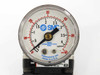 SMC Pneumatics gauge closeup showing dual kgf/cm² and psi scale, Indianapolis Indiana manufacture marking