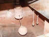 Close-up of collection basin interior with float ball, level sensors, and mineral deposit accumulation