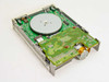 Safronic DS-34A bottom PCB view showing green circuit board, spindle hub, read/write head carriage, and 34-pin edge connector