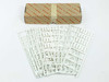 Weidmuller white cable and conduit marker sheets fanned out next to original box, showing both blank and numbered marker strips