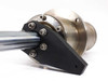 Close-up of black positioning arm bracket and mounting flange bolts on stainless steel rotation cylinder