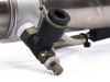 SMC CDM2G32-65-H7BL3 – closeup of elbow-style flow control valve and push-in fitting at cylinder port with needle adjustor