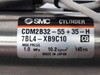 SMC cylinder label showing model CDM2B32-55+35-H-7BL4-XB9C10, max pressure 1.0 MPa / 145 PSI, made in Japan