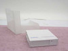 Quantum CompacTape IIIXT DLT III XT cartridge shown flat with protective plastic case standing upright nearby