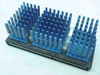 Intel Pentium II Slot 1 processor – bottom and rear view showing blue aluminum heatsink fins and SEC cartridge edge connector
