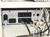 Power distribution unit rear panel showing multiple IEC C13 output receptacles, IEC C14 input, and power cabling