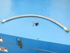 P Energy L150A laminator top surface showing braided stainless steel accessory hose with brass fittings and a hose clamp fitting laid out on blue panel