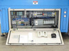P Energy L150A laminator full electrical control cabinet interior – Siemens S7-300 PLC rack, Micromaster 420 VFD, circuit breakers, contactors, solid-state relays, and terminal wiring; documentation pouch on door