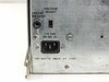 Close-up of rear panel power section on Nicolet 068-7528 — circuit breaker button, voltage select toggle at 115, IEC inlet, and '100 WATTS MAX AT 115V' label