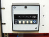 ATC Automatic Timing Controls timer module close-up — digital readout showing 0151 min with four pushbutton preset keys