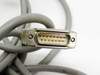 DB15 15-pin male connector close-up on end of gray interface cable