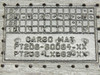 Lexus cargo mat rubber underside — molded label showing part numbers PT206-60084-XX and PT206-LX083-XX with year grid