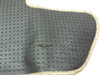 Lexus cargo mat rubber underside — center close-up showing additional crack and rubber separation along a fold crease