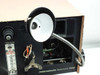 Semiconductor Equipment Corp 4450 — close-up of gooseneck inspection lamp with circular reflector/illuminator head positioned over gas temperature bay area