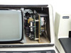 Sloan Dektak IIA module interface unit — interior view showing exposed PCBs, transformers, and electronic components behind CRT; 'Dektak IIA' label visible on scan head