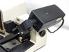 Sloan Dektak IIA scan head — side view of optical/sensor head assembly raised, showing stylus arm and scan head body with interconnect cable