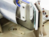 Close-up of the Nicolet 740 PBSE detector optical assembly — white plastic mount holding detector window/element, cylindrical dewar housing, blue tubing fitting, and adjustment screws