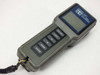 YSI 85 handheld meter front panel with LCD display and control buttons, angled view