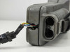 Bottom of YSI 85 meter showing multi-pin cable connector with exposed colored wires at junction