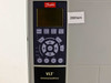 Danfoss VLT AutomationDrive FC-302 — close-up of LCP control panel with Status, Quick Menu, Main Menu, Alarm Log, and navigation buttons; handwritten 2800rpm note visible