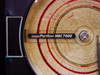 Close-up of Partlow MRC 7000 circular chart recorder label and chart paper with recorded temperature and humidity traces