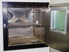 Alliance 8CF chamber interior showing stainless steel walls, two wire mesh shelves, and front door with viewing window open