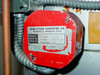 Pure-Steam Humidifier Co. red label showing Voltage 2000, 240/120V, Amperage 8.3, Minneapolis Minnesota