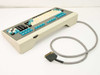 Perkin-Elmer Infrared Data Station terminal keyboard – angled three-quarter rear view showing low-profile housing and proprietary cable