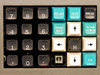 Numeric keypad and function key cluster showing RELOAD, USER, BREAK, ERASE INPUT, CLEAR SCREEN, SYS keys and missing key position next to down arrow