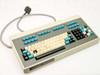 Perkin-Elmer 55000-0147 Infrared Data Station keyboard – full top view showing teal, cream, and black key layout with attached cable