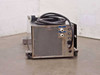 Tecumseh AE9417EG compressor unit – left-rear exterior view showing perforated condenser grille, fluid fittings, control panel side, and power cable coiled on top