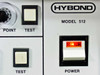 Hybond Model 512 front panel close-up showing Point, Test buttons and illuminated Power switch with red indicator light on