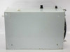 Right side view of clean room enclosure showing white painted exterior with top-mounted black knobs and fan/filter grille on far right panel