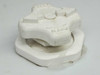 Close-up of white polymer or ceramic anti-vibration/isolation mount component with circular ring design and OPEN markings