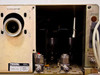 Tegal 701D rear panel showing vacuum pump port, gas manifold solenoid valves, and second Tegal serial/model label