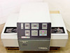 Tegal 803 Plasma Inline RF Wafer Etcher front view with cover on showing control panel and wafer handler arms