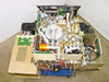 Tegal 803 Plasma Etcher – top-down interior view with covers removed showing reactor chamber, plumbing, gas lines, circuit boards, and internal subassemblies