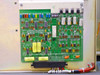 Tegal 803 – interior view of large green main control/power PCB with multiple ICs, capacitors, relays, and edge connector