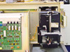 Tegal 803 – interior close-up of wafer transport/handler mechanism showing motorized loader assembly and associated wiring